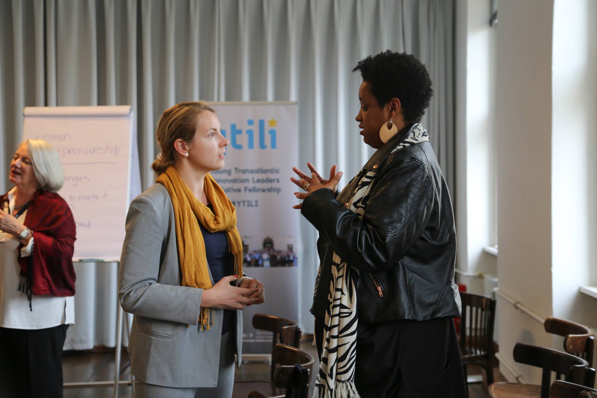 Two YTILI Fellows having a Dialogue at a YTILI event.